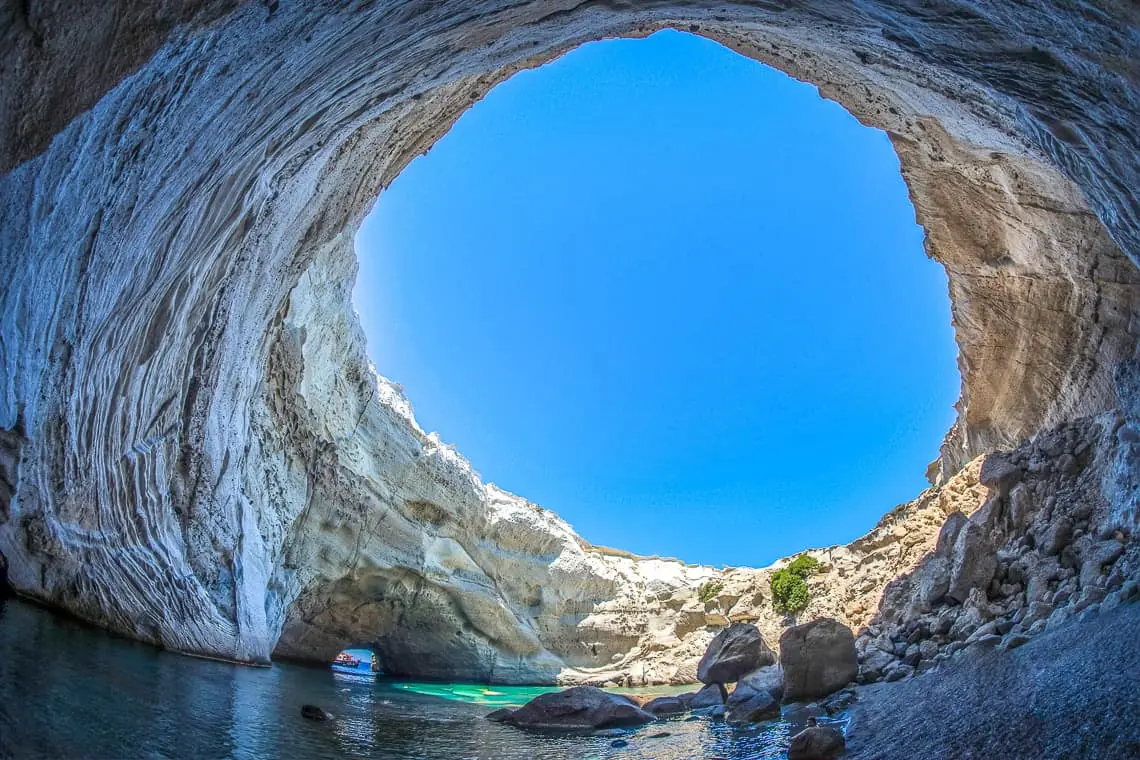 Looking up through the open roof of Sykia cave, Milos